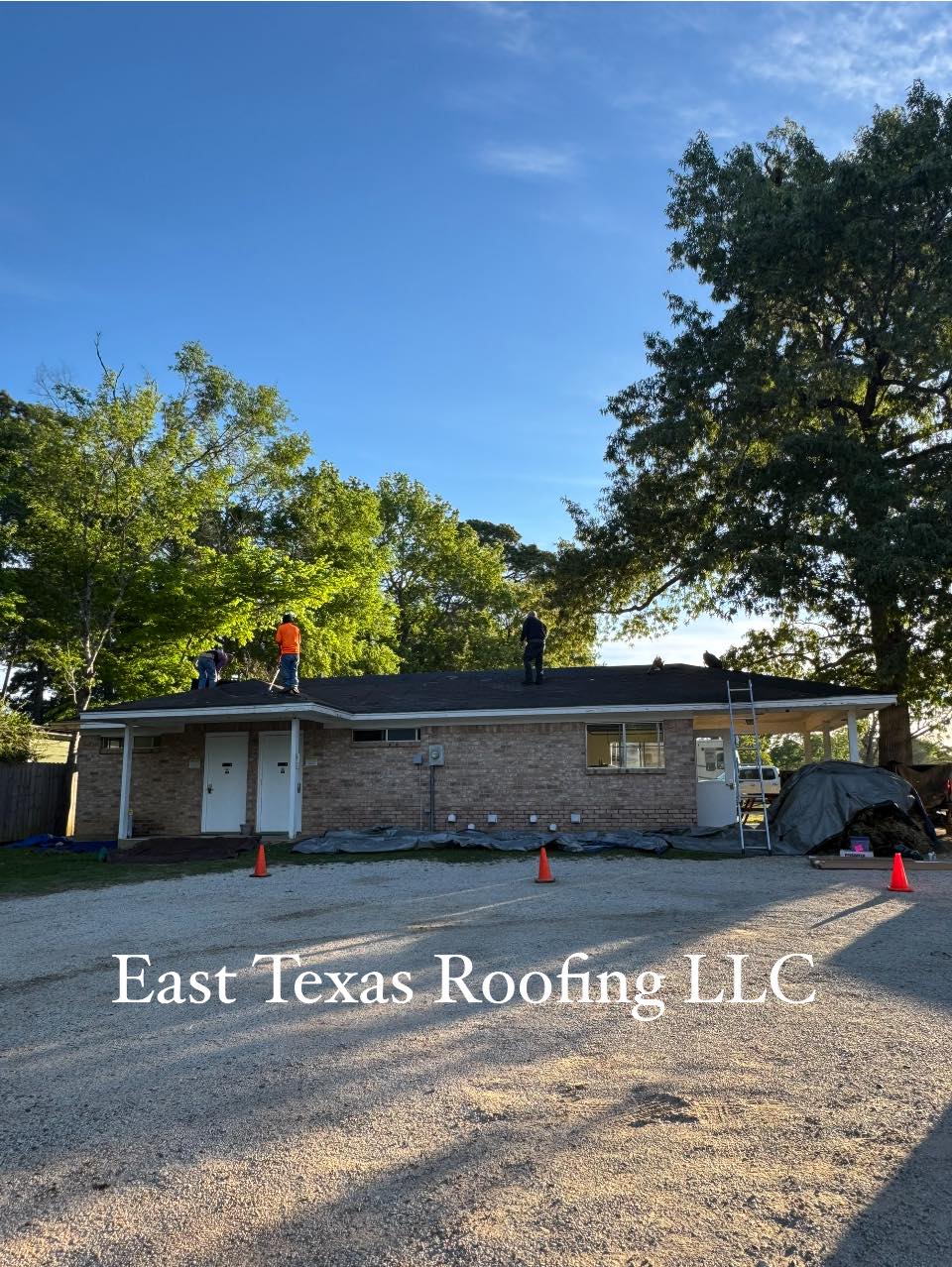 East Texas Roofing crew working on a residential roof